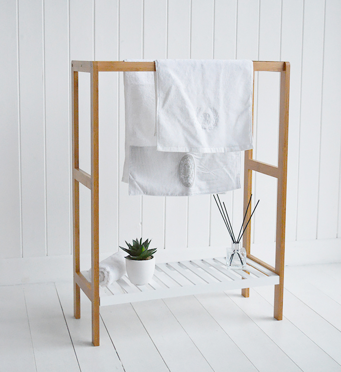 Freestanding wooden towel stand with white shelf