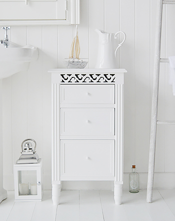White bathroom cabinet with drawers for bathroom toiletries and make up. Traditionally white furniture in the bathroom is the most used as it reflects lighthouse in what in generally a small space