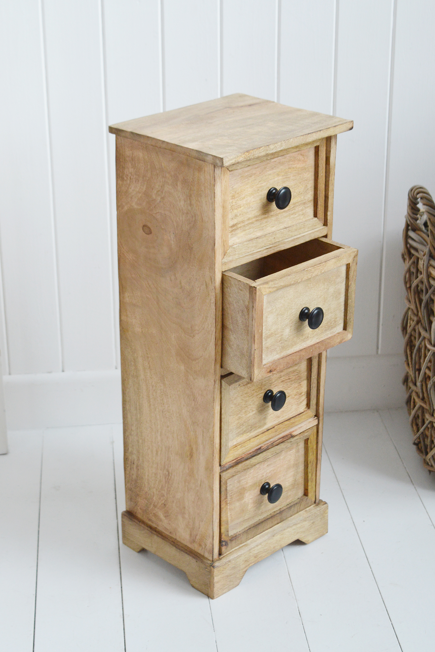 Dorset narrow bedside cabinet. A table with drawers that is 23 cm wide. Slim bedside tables in Mango wood