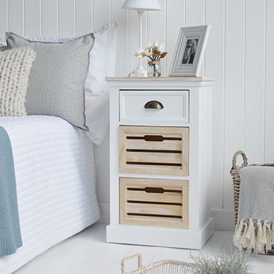 The Southport White Cabinet with three drawers - A white bedside table or cabinet for Modern Country, Farmhouse and Coastal Furniture. The calming tones of the white washed wood of the drawers and top, against the white body lend to a light and airy feel to your space