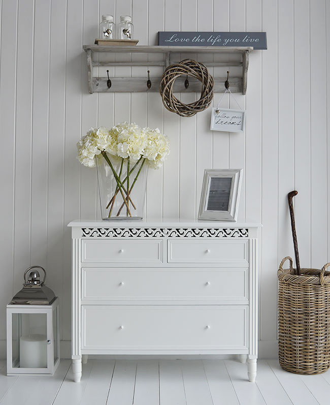 White Chest of draws from New England. Great idea  for white hall furniture in coastal, and traditional interior design. Shown here with coat hooks and Casco Bay umbrella holder