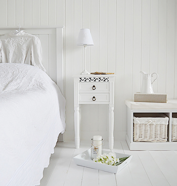 White bedside table with drawers