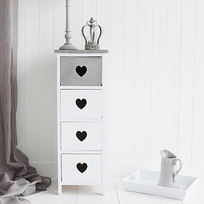 The Heart Cottage 4 drawer narrow chest of drawers

The Heart Cottage is a grey and white range of furniture in a rustic styled finish, ideal for New England, both country and coastal styled home interiors.