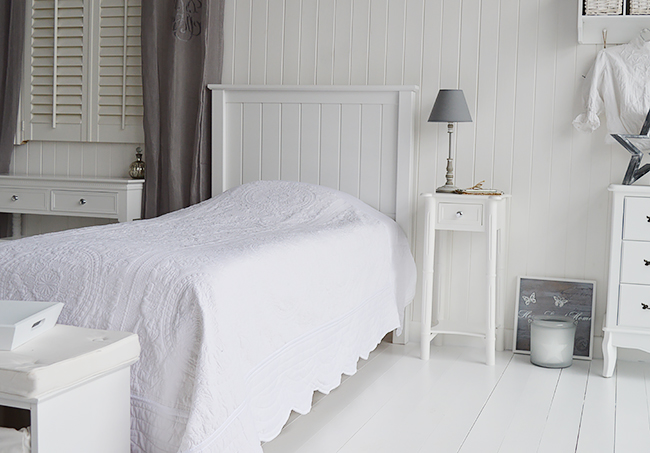White bedroom with silver and grey accessories