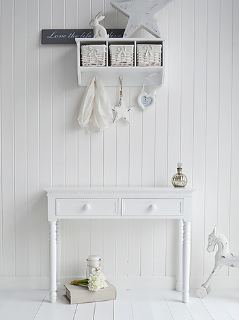 The New England white dressing table with two drawers and chunky knob ceramic handles. Perfect for any bedroom