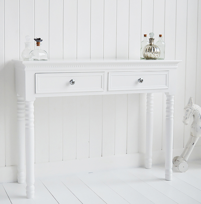 Side photograph of The New England white dressing table with silver handels on the drawers
