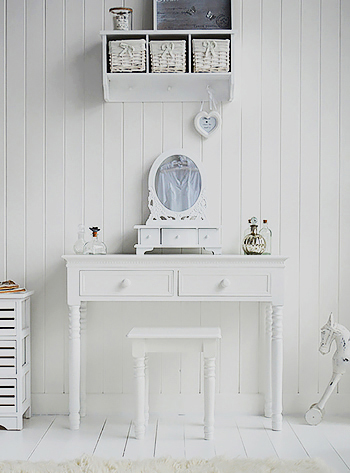The New England white dressing table shown with trinket mirror
