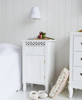 New England pot cupboard, storage for a number of books.