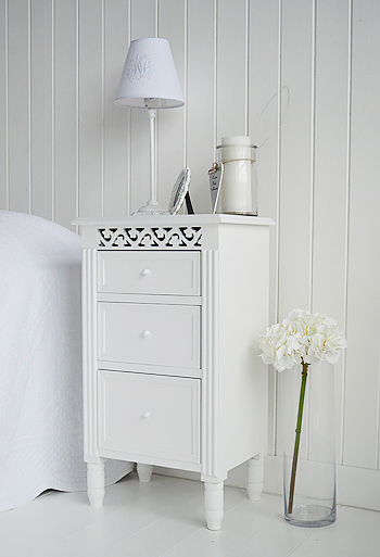 Bedside cabinet in white with three drawers for storage