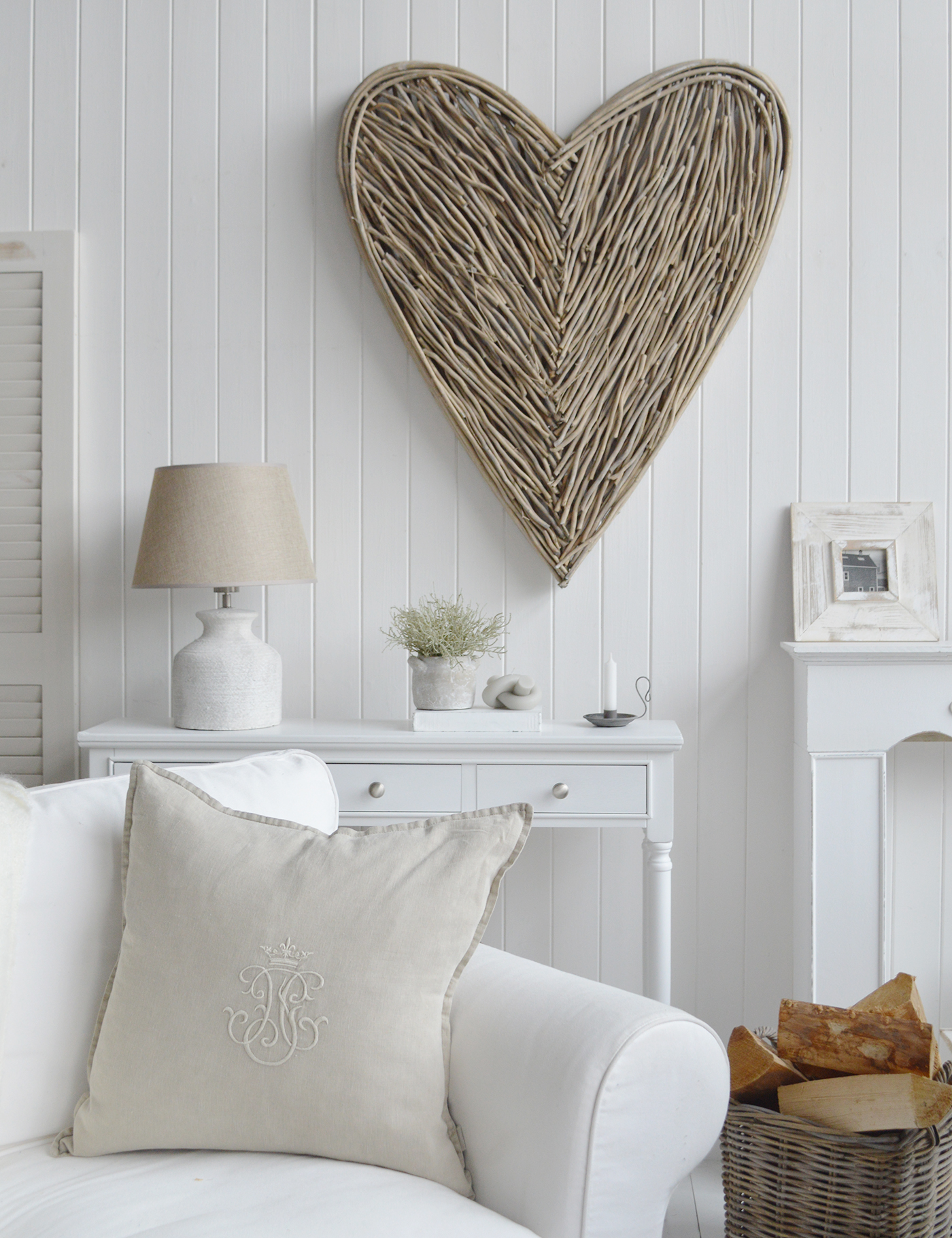 Neutral cushions and throws add to the warmth of a room when choosing a traditional modern country styled room