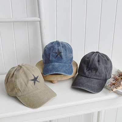 The Sand Star Cap brings a soft, neutral warmth to your look, inspired by coastal dunes and designed to complement relaxed beach house style.
