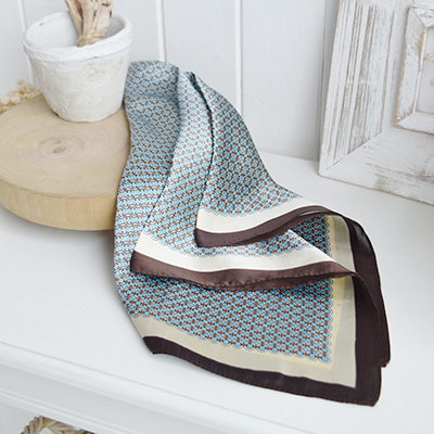     Inspired by ocean breezes and elegant seaside retreats, the Newport Scarf Collection celebrates effortless coastal style.