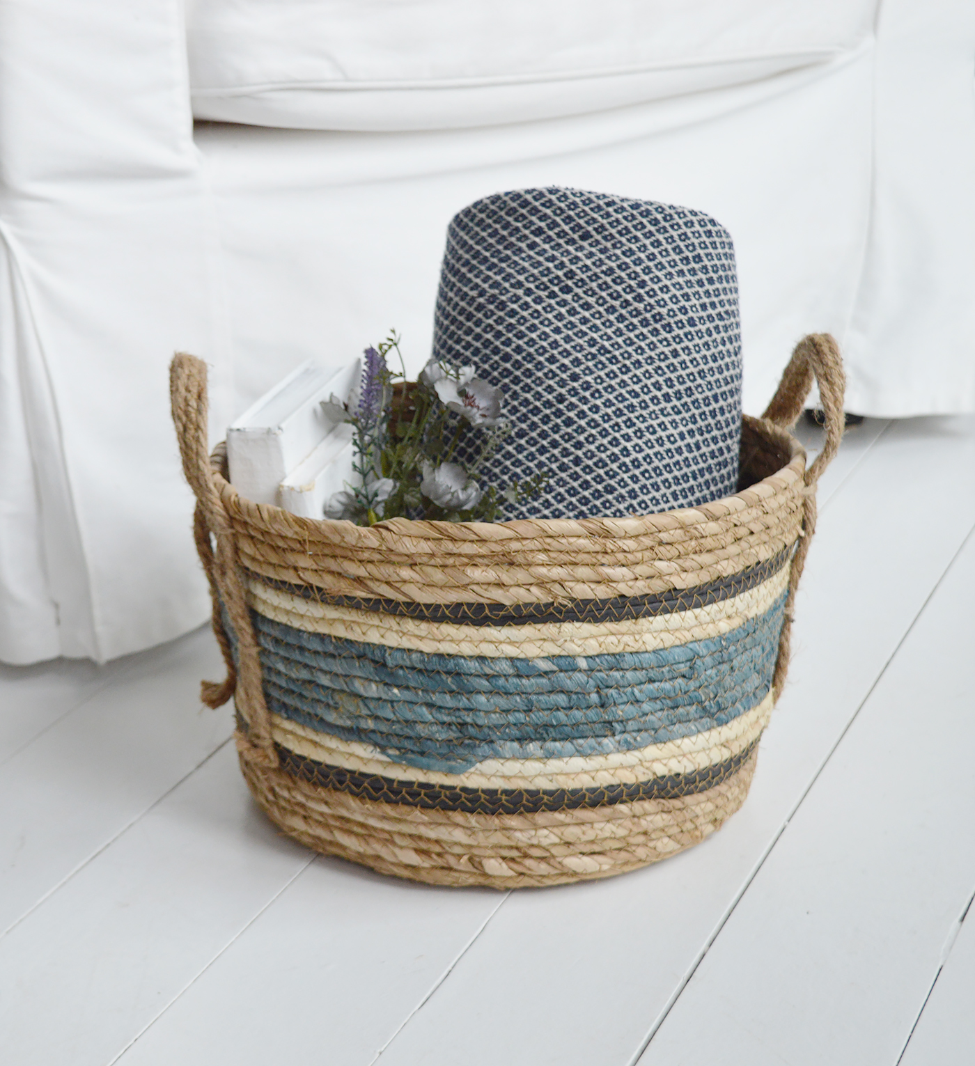 The Princeton basket with blue stripes for a coastal inspired interior. New England furniture for all modern farmhouse, country and coastal homes from The White Lighthouse