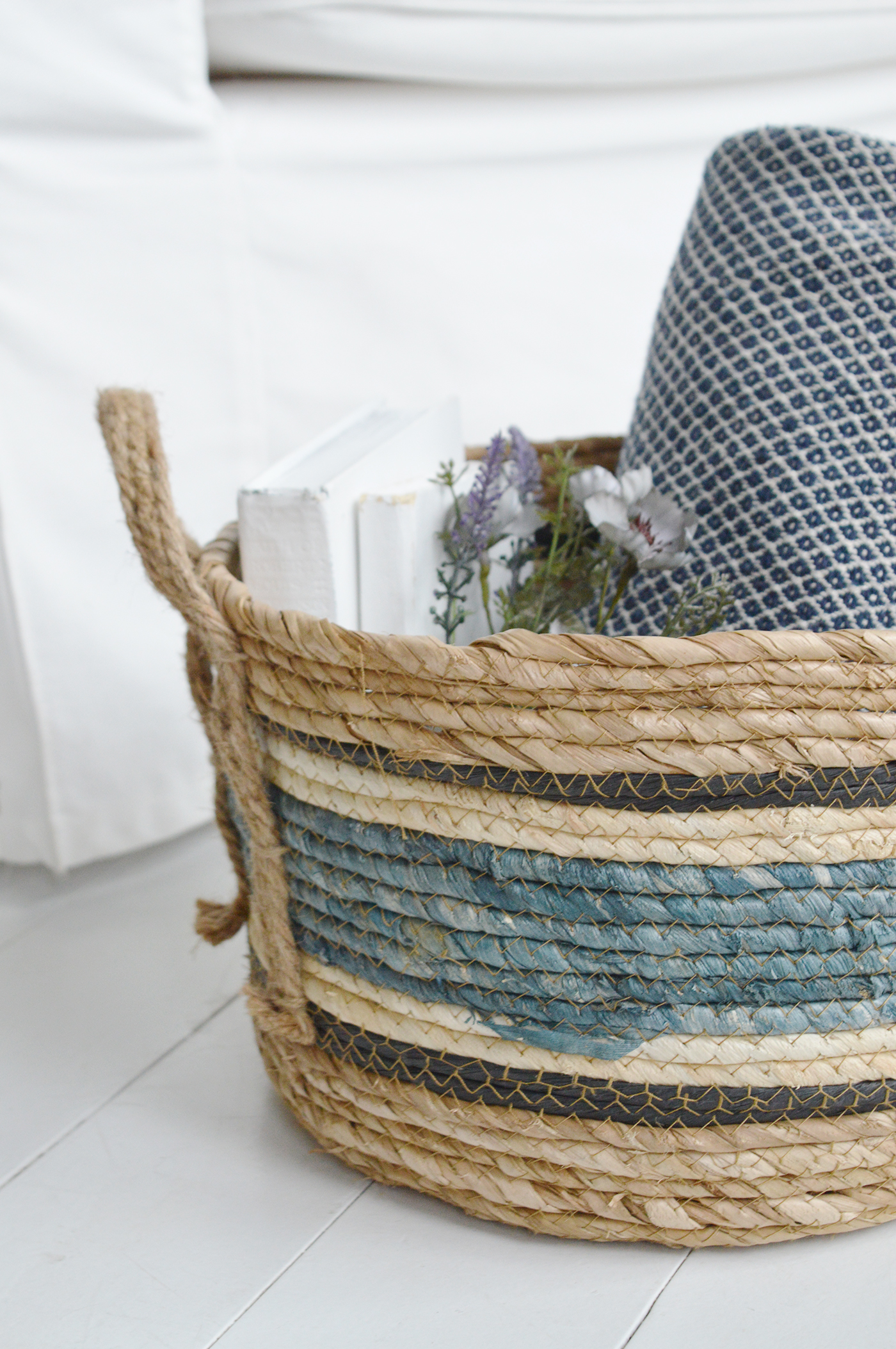 The Princeton basket with blue stripes for a coastal inspired interior. New England furniture for all modern farmhouse, country and coastal homes from The White Lighthouse