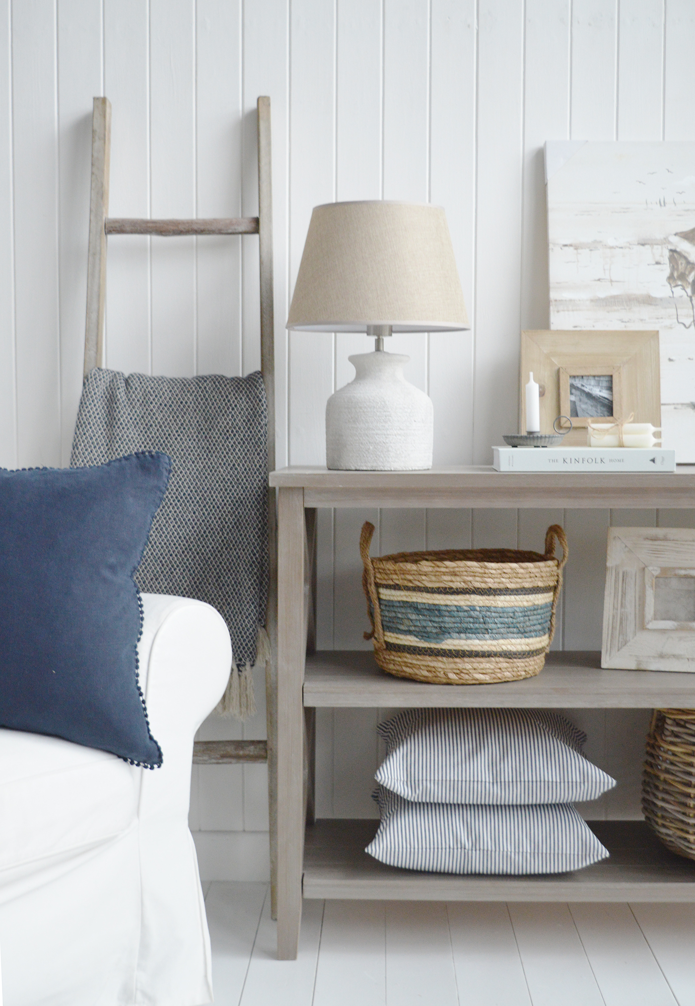 The Princeton basket with blue stripes for a coastal inspired interior. New England furniture for all modern farmhouse, country and coastal homes from The White Lighthouse