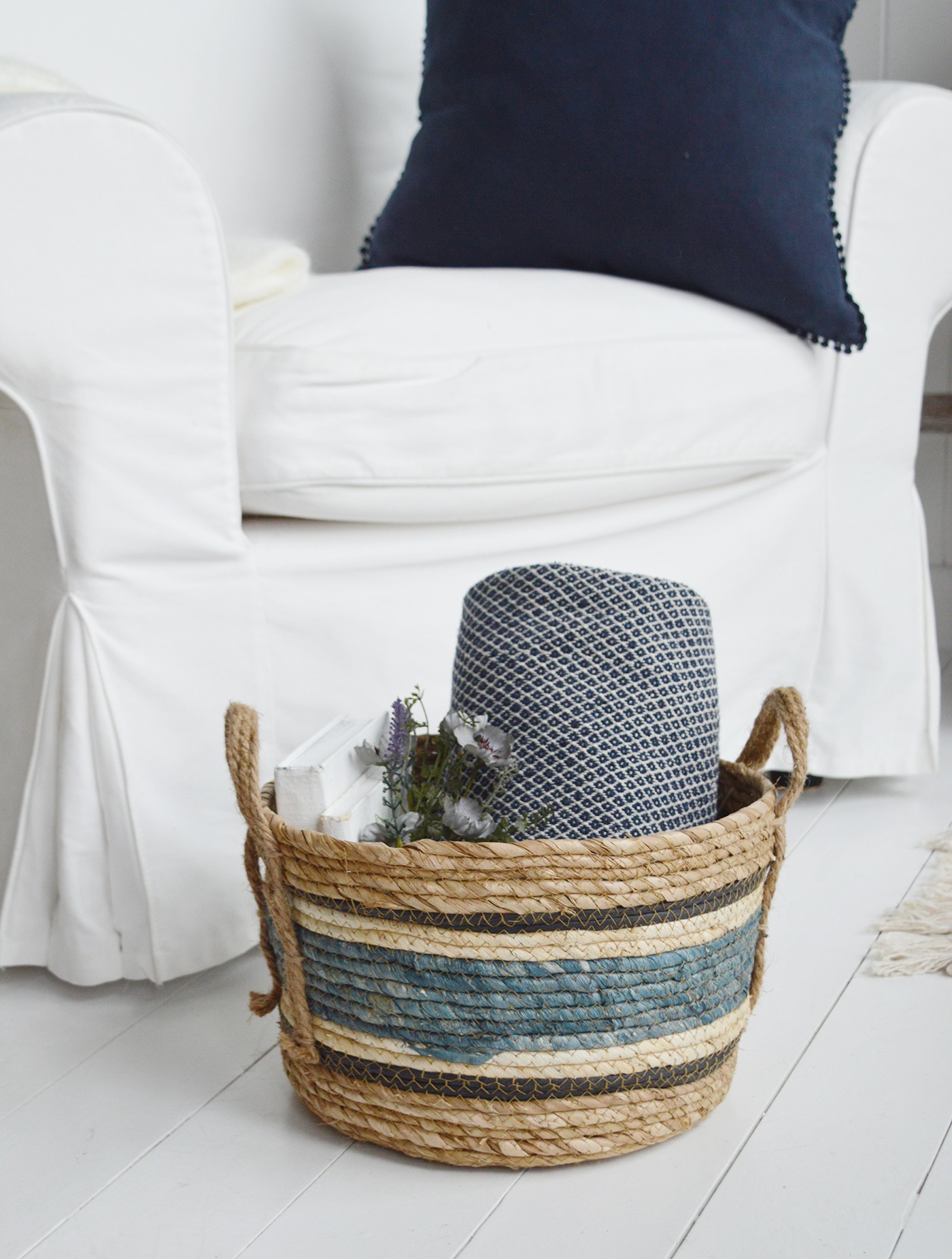 The Princeton basket with blue stripes for a coastal inspired interior. New England furniture for all modern farmhouse, country and coastal homes from The White Lighthouse