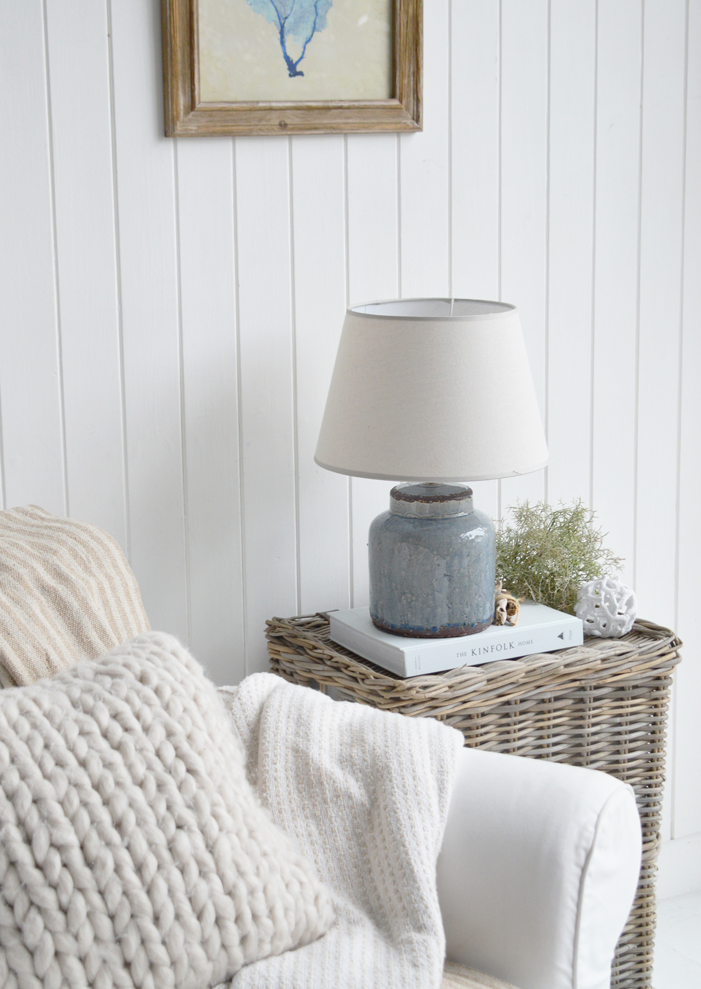 The natural wicker weave and neutral tones complement whitewashed walls, shiplap, and farmhouse-style furniture.