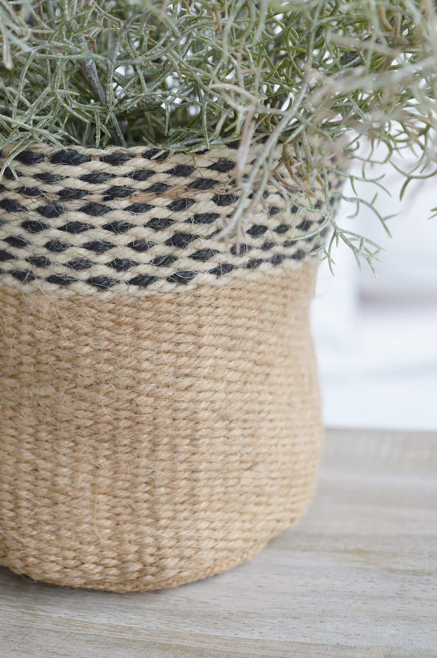 Add warmth and character to shelves, console tables and windowsills with this versatile woven jute planter, designed to complement relaxed coastal living.