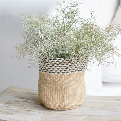 Add natural texture to your home with the Bayside Jute Planter. A woven indoor plant pot with a waterproof liner, perfect for coastal, New England and modern country interiors.