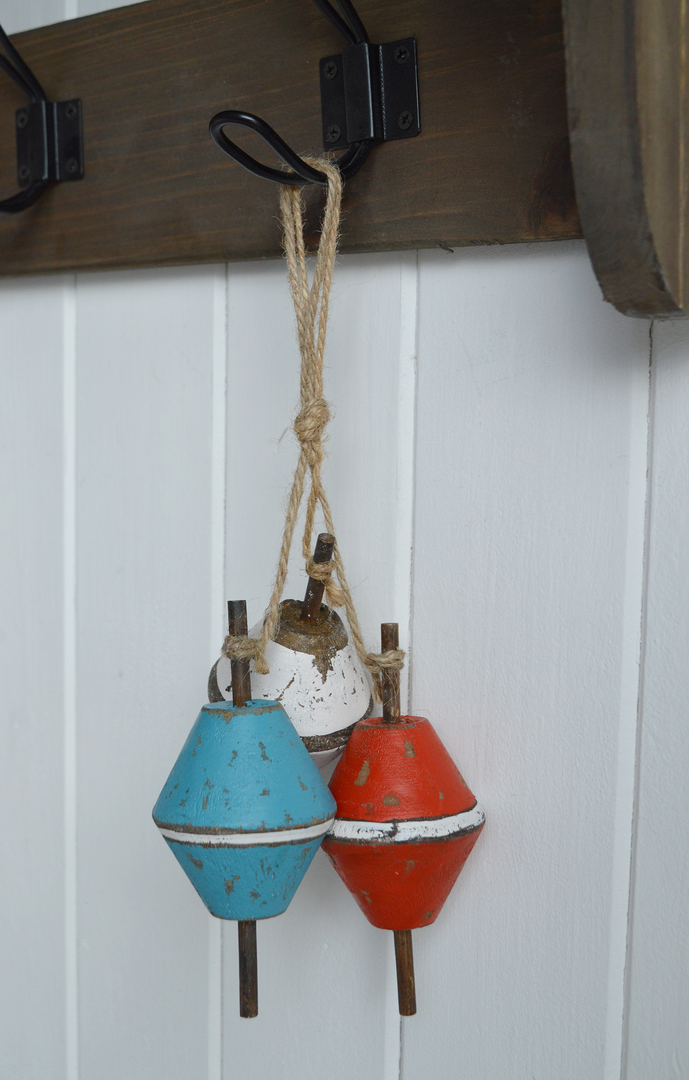 Vintage-inspired wooden floats as accents in beachhouse interiors