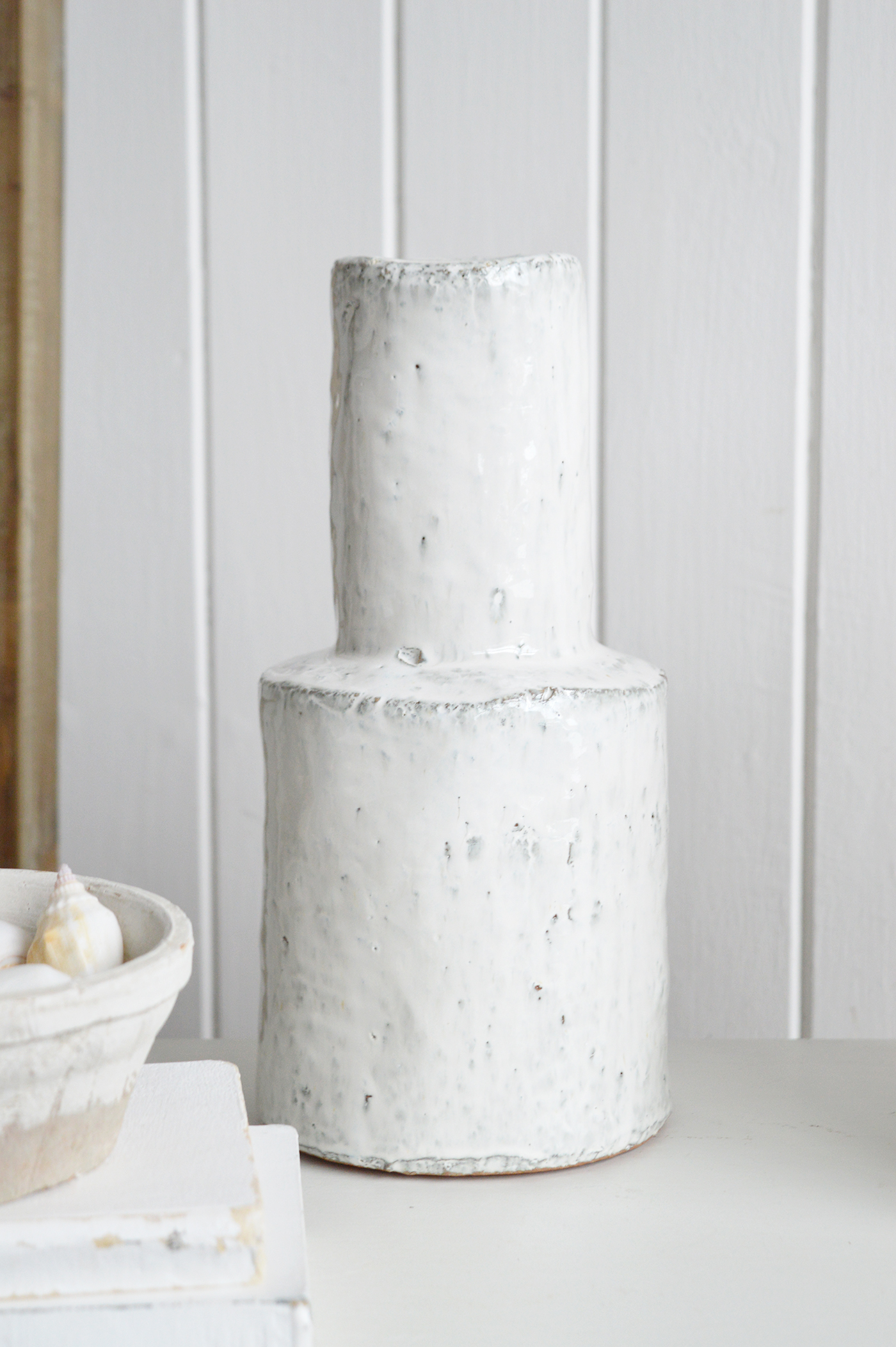 With its sculptural form, the Tall Betone Vase is a statement accessory that elevates modern coastal interiors.