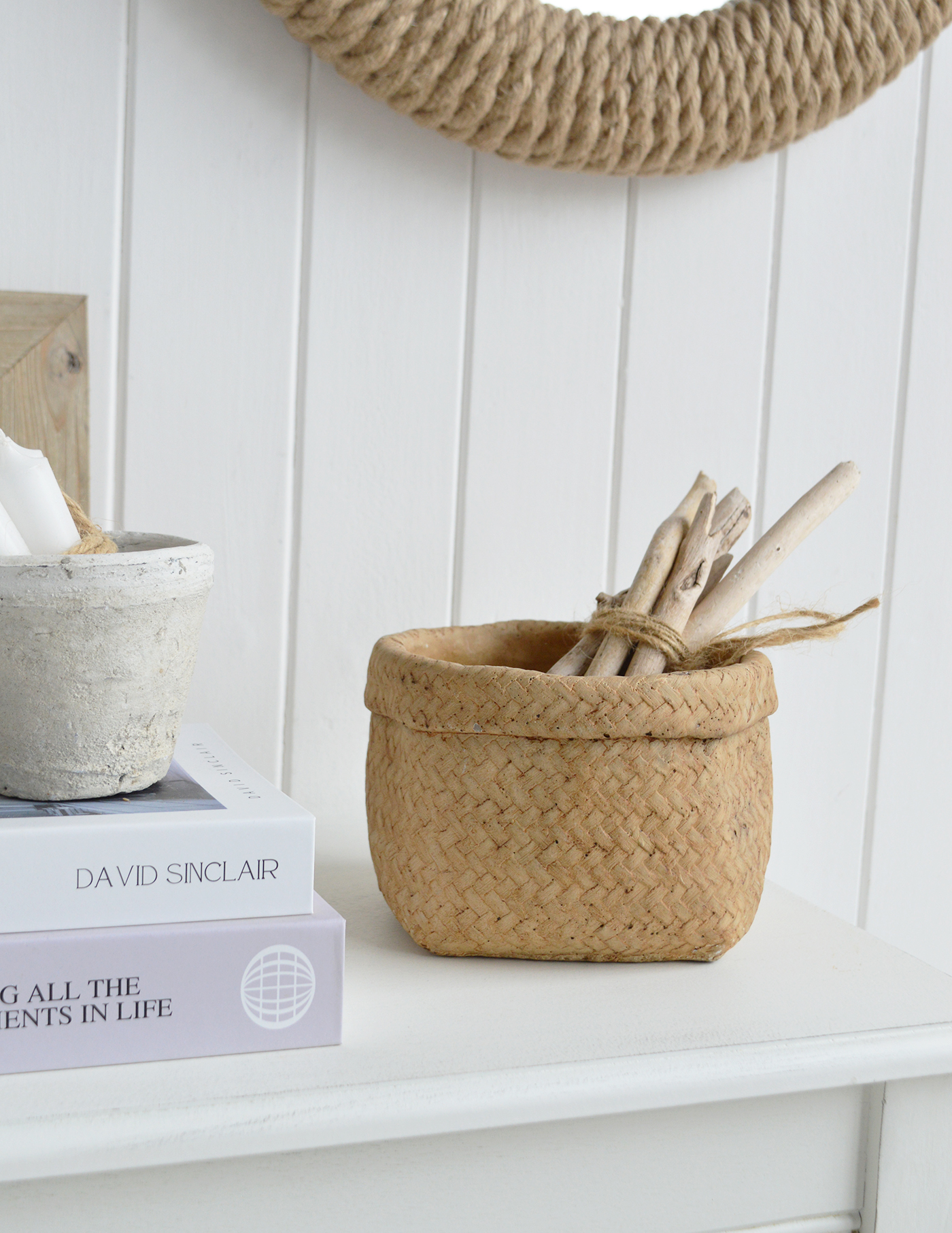 Rustic woven details of driftwood bring natural warmth and an easy bohemian spirit to coastal styling