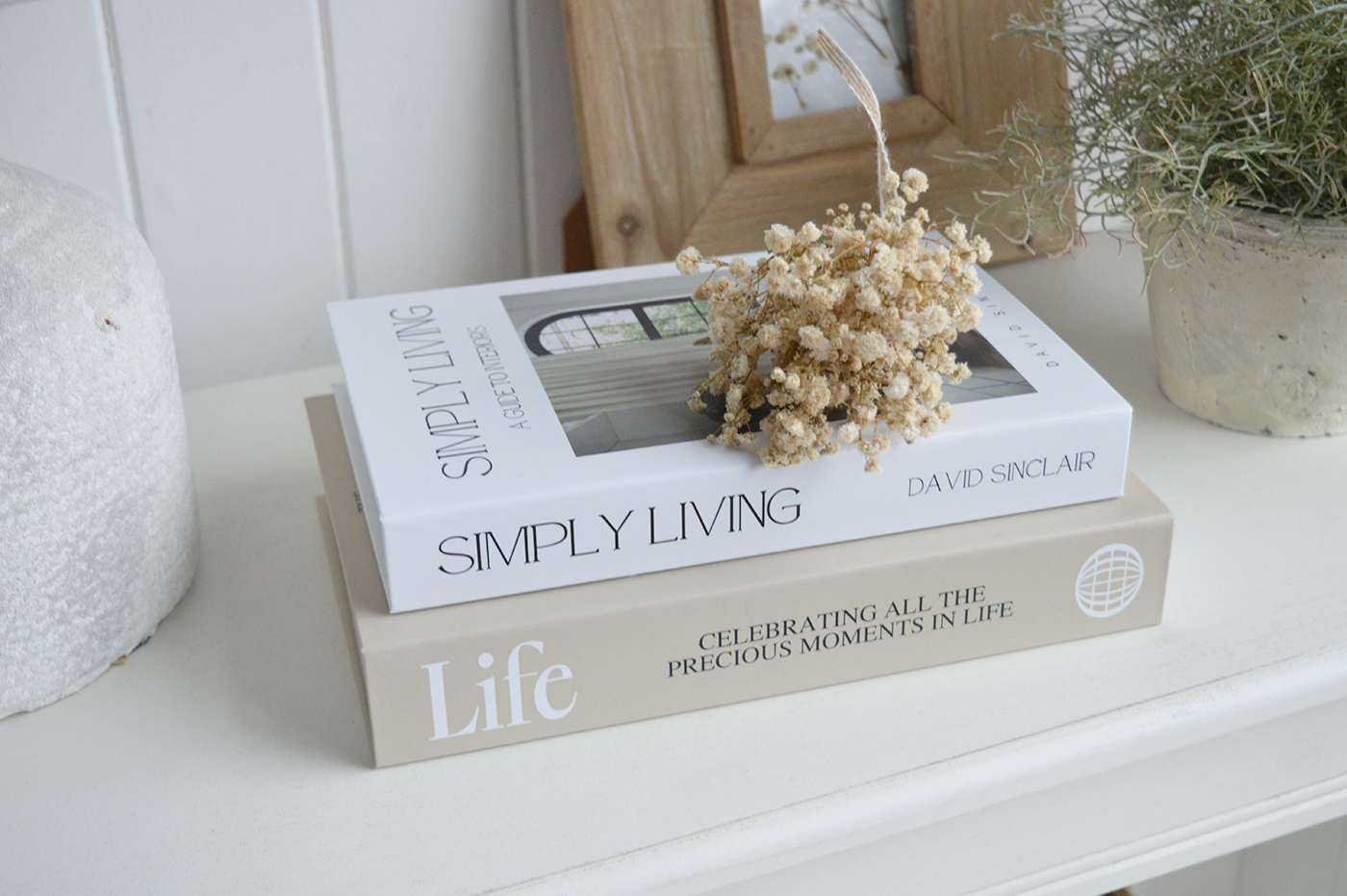 Perfect for coastal interiors, these neutral decorative books complement whitewashed woods, soft linens and relaxed, light-filled living spaces.