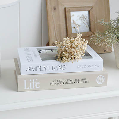 Perfect for coastal interiors, these neutral decorative books complement whitewashed woods, soft linens and relaxed, light-filled living spaces..