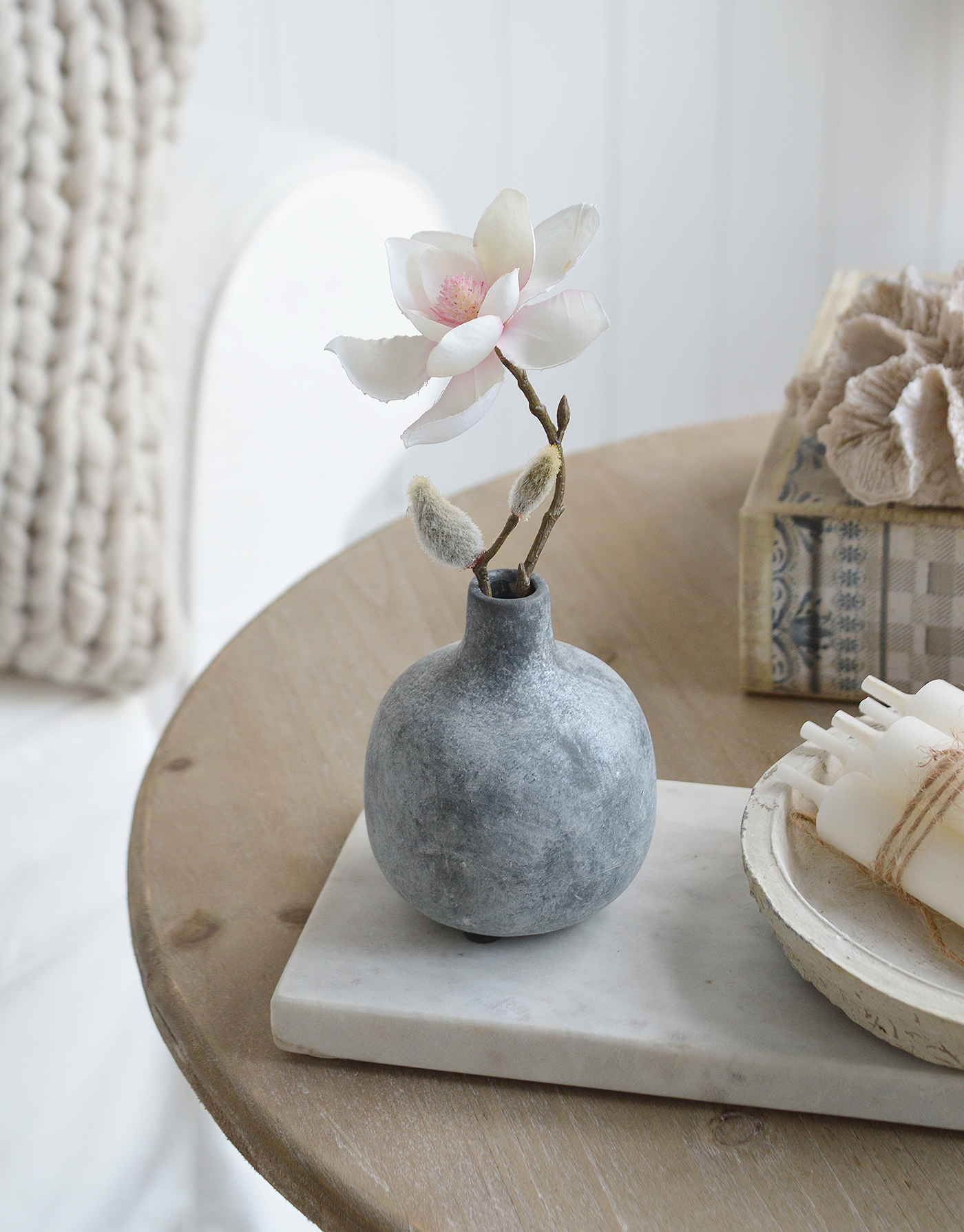 Slate coloured small Bradley pot with a stem of Magnolia