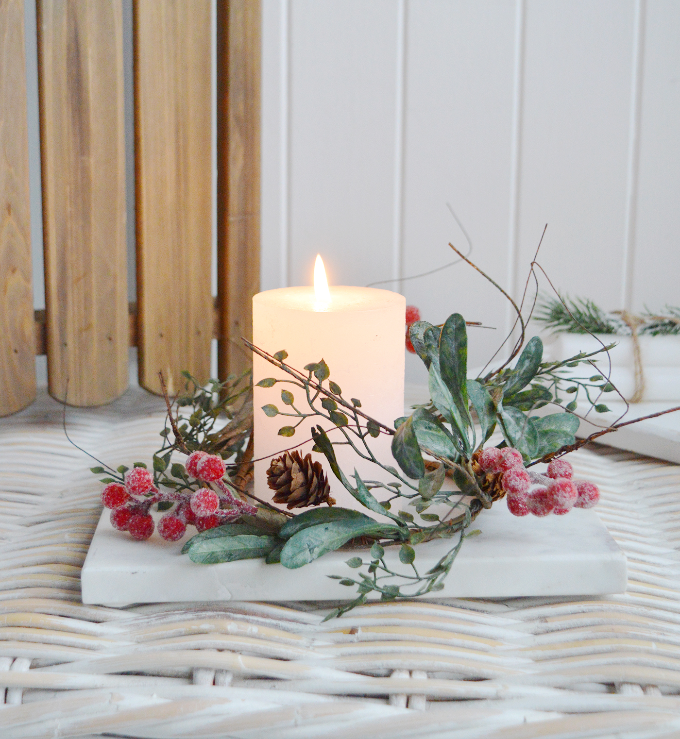 Create a beautiful centerpiece with this gorgeous winter candle ring with gently frosted leaves, little pinecones and contrasting red berries - Luxury Christmas table decoration from The White Lighhtouse New England Stlye homes and interiors