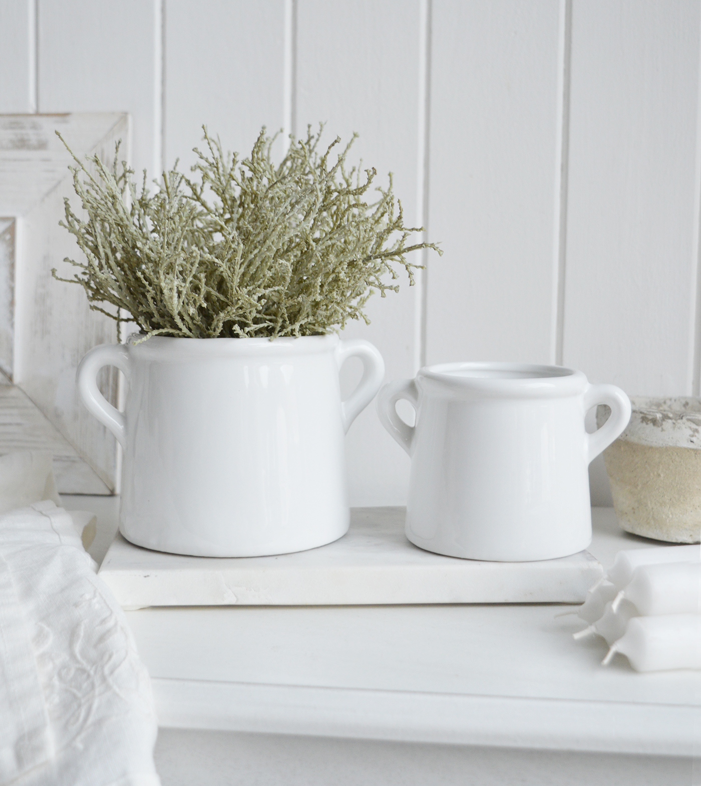 Faux silver cotton lavender in a white ceramic pot