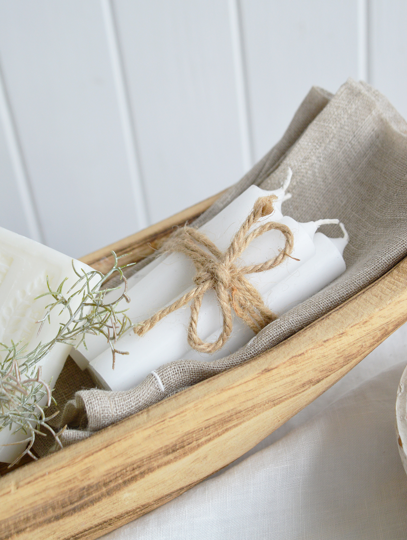 The Chadwick rustic wooden dough bowl showcases a beautiful, elongated design crafted from natural wood, with its earthy tones and organic grain patterns giving it a warm, timeless appeal that effortlessly enhances both modern and farmhouse interiors.