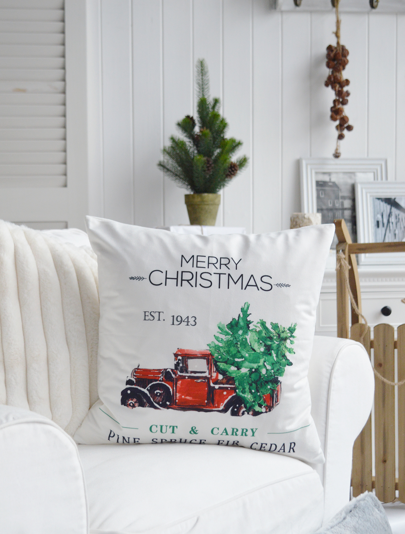 Ski lodge christmas decor for modern farmhouse and country homes... sleighs, ski poles, cushions, throws