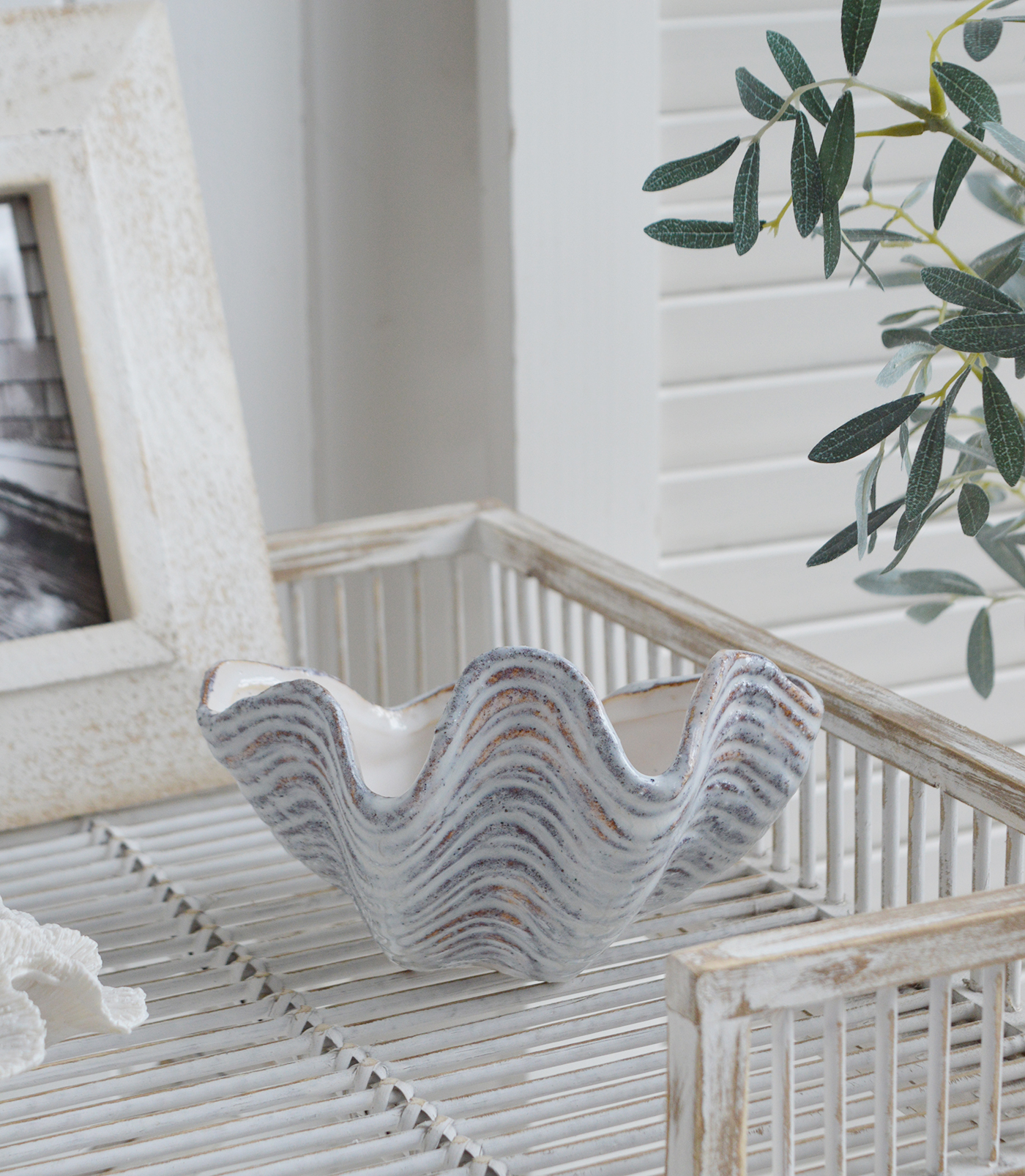 Ceramic clam for elegant Hamptons styling of a console in a Beach House Coastal home