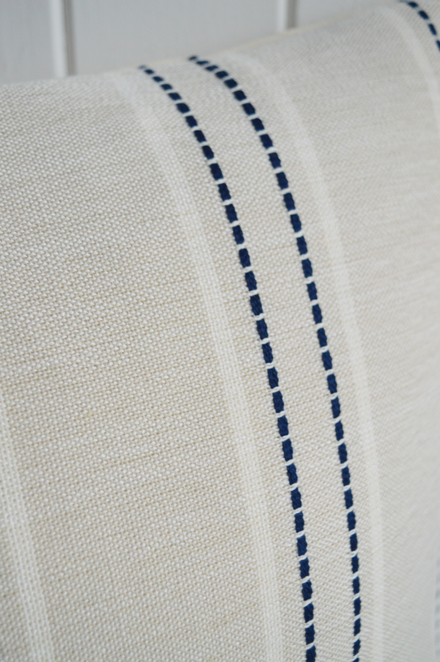 A versatile stripe cushion designed for modern country and calm coastal interiors.