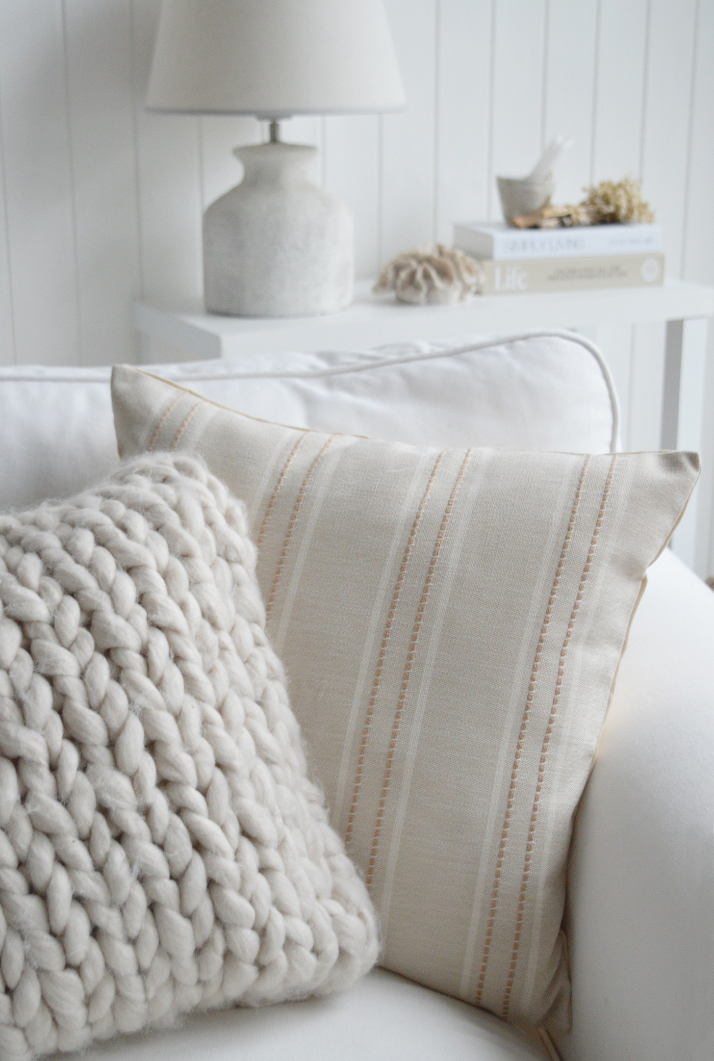 The Cotsmere neutral stripe cushion cover is perfect for creating layered neutral interiors, pairing effortlessly with linen sofas, rattan accents and natural textures.