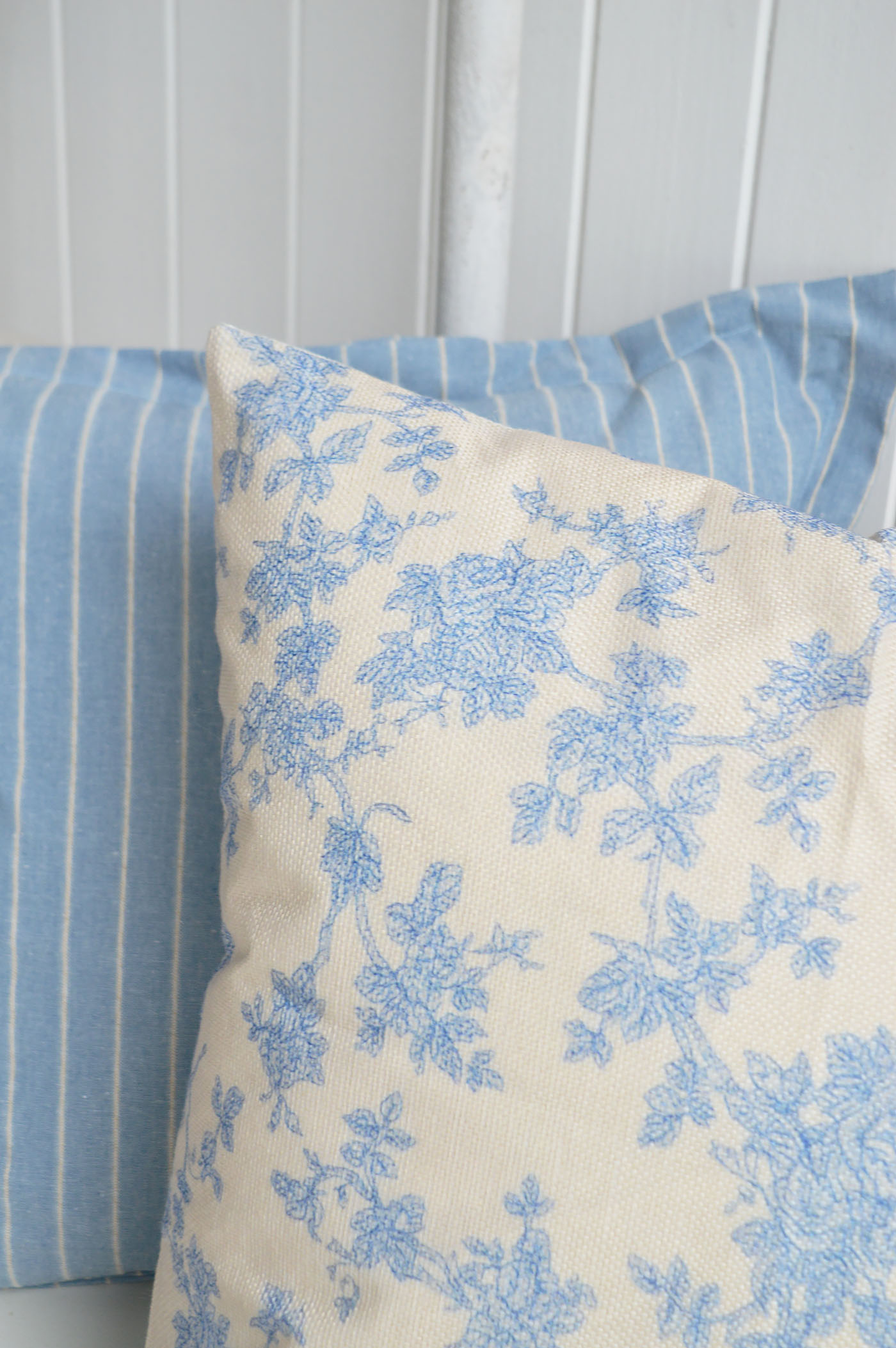 Layered with soft sky blue stripes, the Haverhill cushion cover brings a calm, classic Hamptons feel to relaxed neutral interiors.