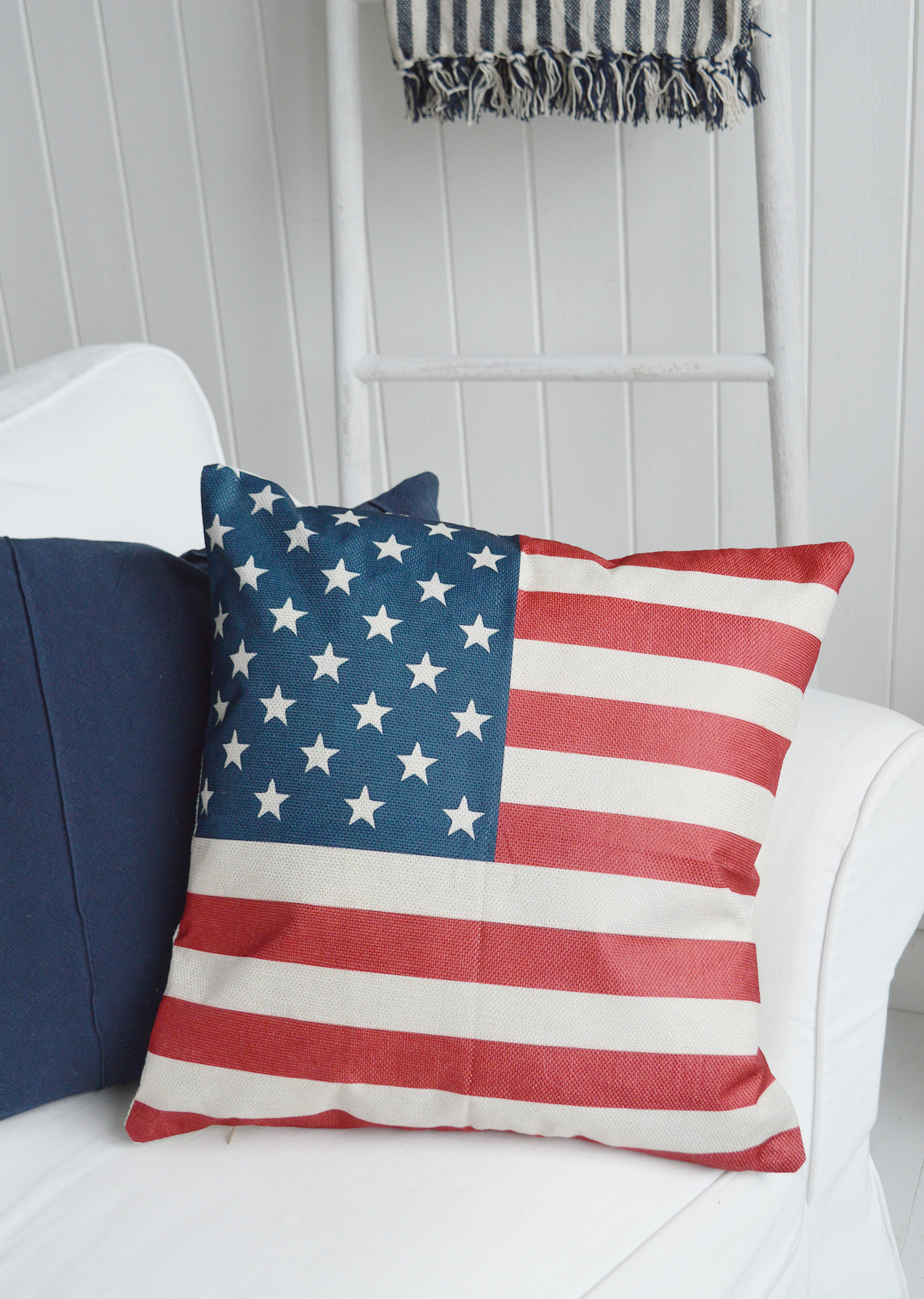 Style this navy and red cushion with coastal furniture and neutral interiors for a relaxed beach house look.