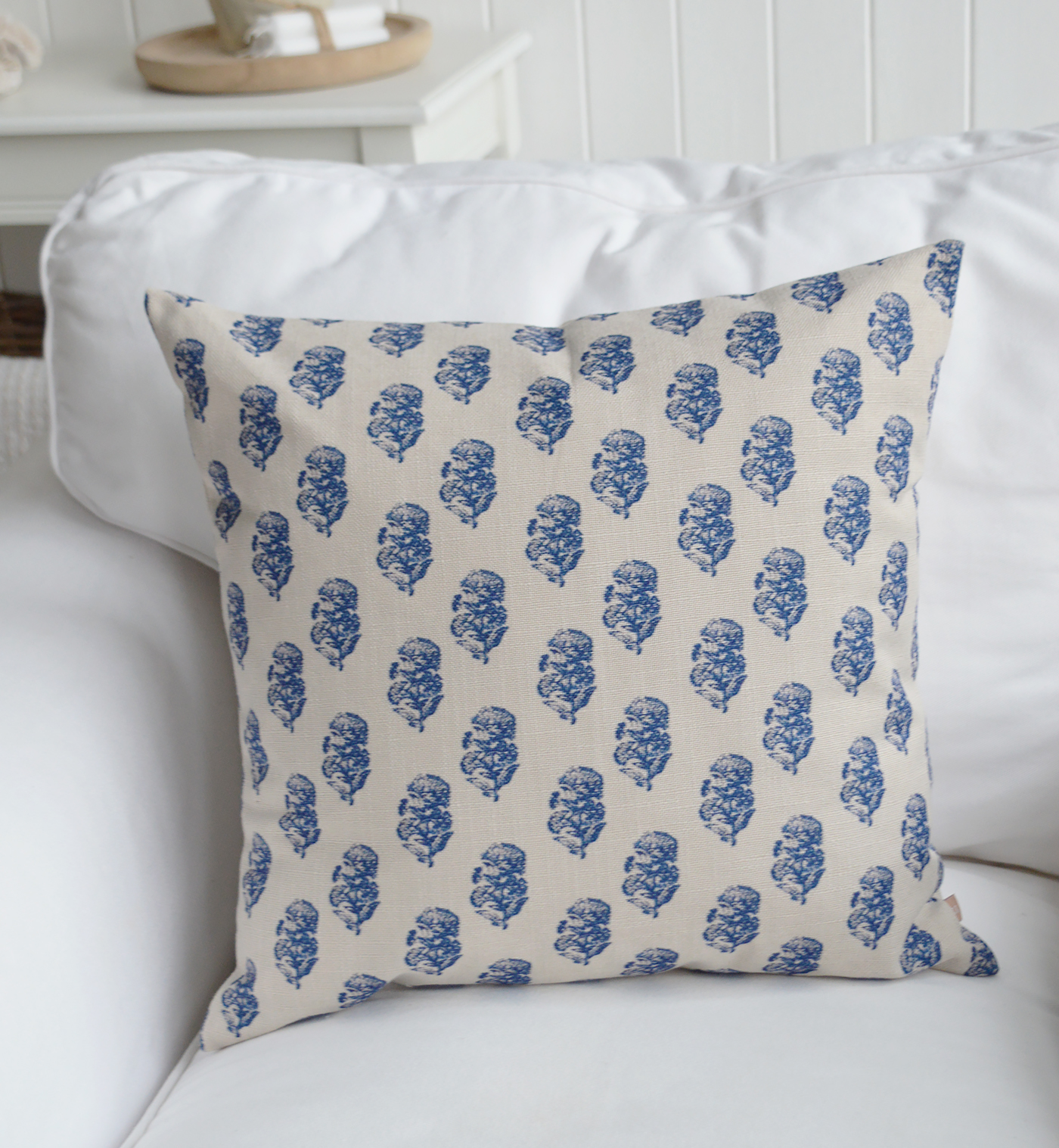 Blue botanical print throw pillow for coastal décor