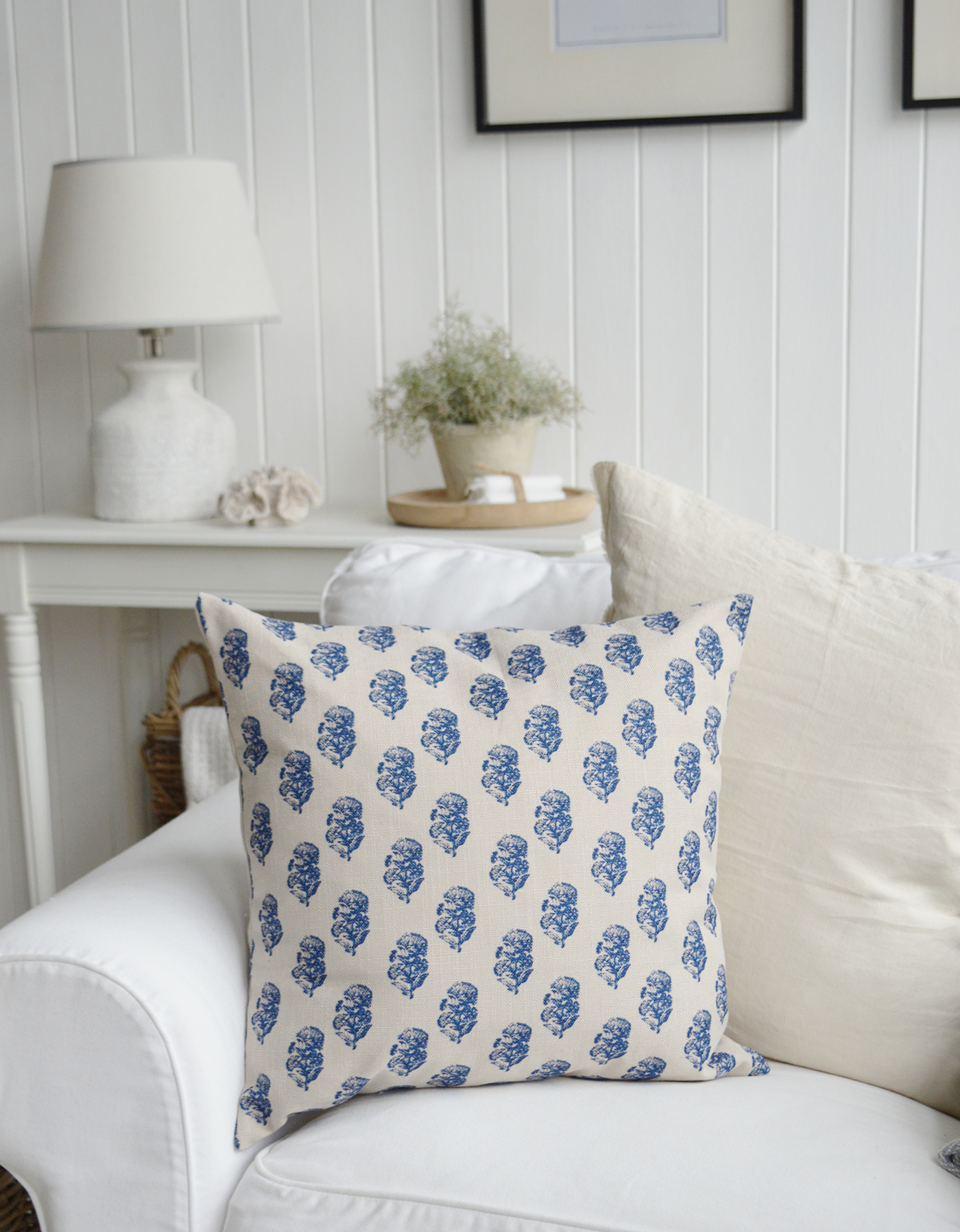 Coastal living room accent pillow in blue and white