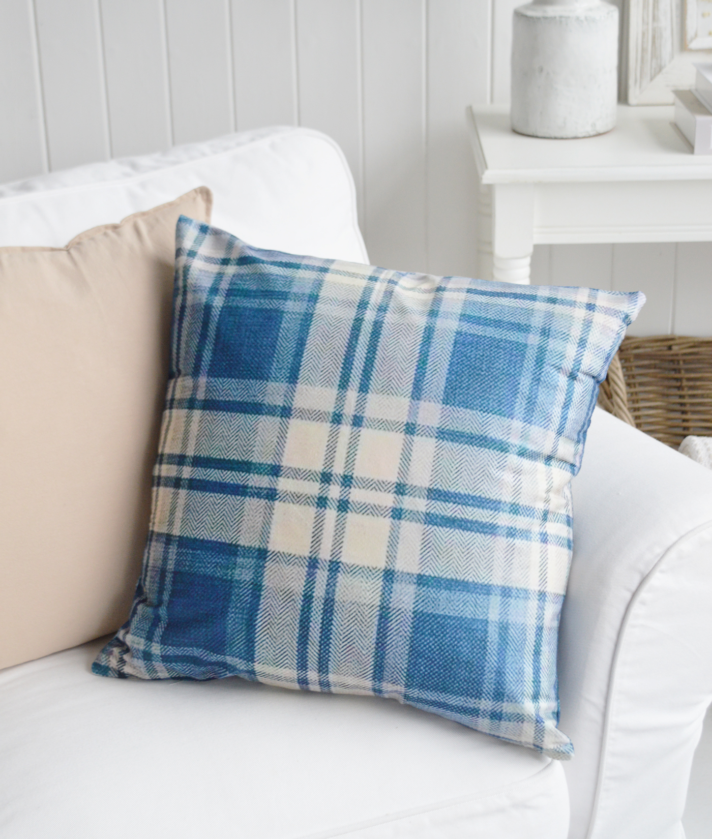 Inspired by classic New England homes, this printed cushion brings a relaxed and welcoming feel to any room. Add depth and texture to your coastal interiors with this soft-touch blue plaid cushion cover.