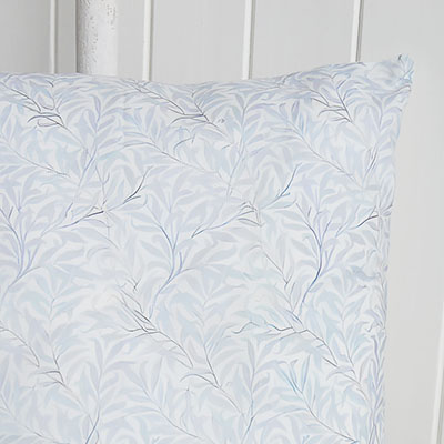 The Dalton Cushion Cover features a delicate pale blue botanical print inspired by timeless coastal interiors and relaxed Hamptons interiors, bringing a soft New England interiors feel to your home while pairing beautifully with luxury cushions, neutral linens and elegant coastal furniture.