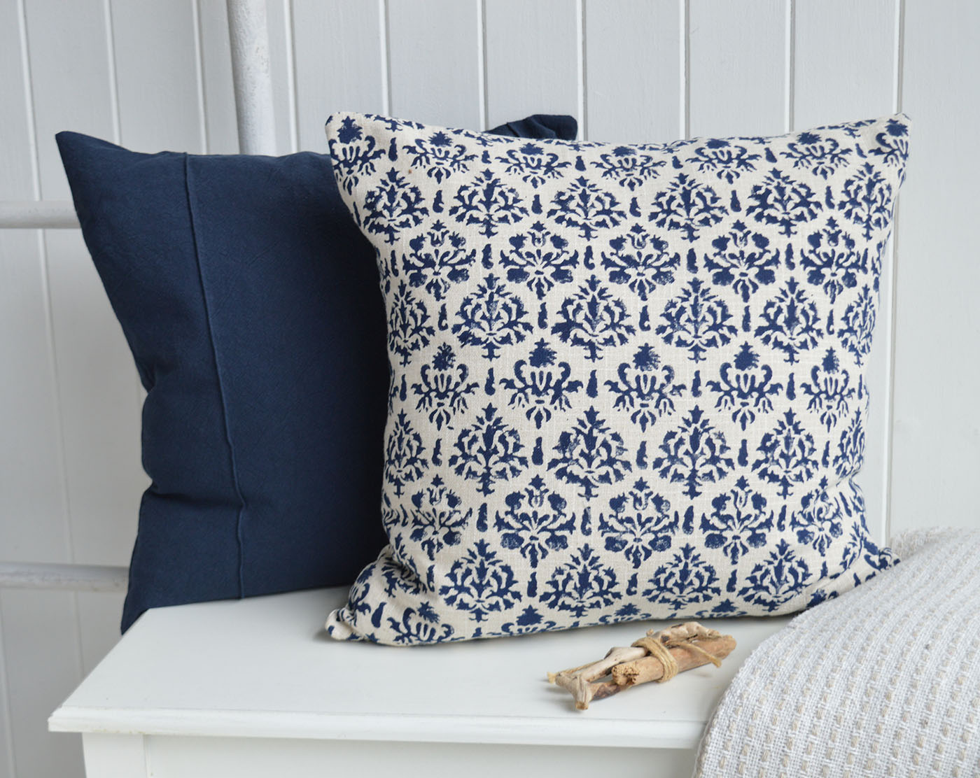The rich navy tones of the Marlow Cushion Cover pair beautifully with the timeless blue patterned design, creating an elegant layered look perfect for coastal interiors, Hamptons interiors and sophisticated New England interiors inspired by relaxed seaside living.