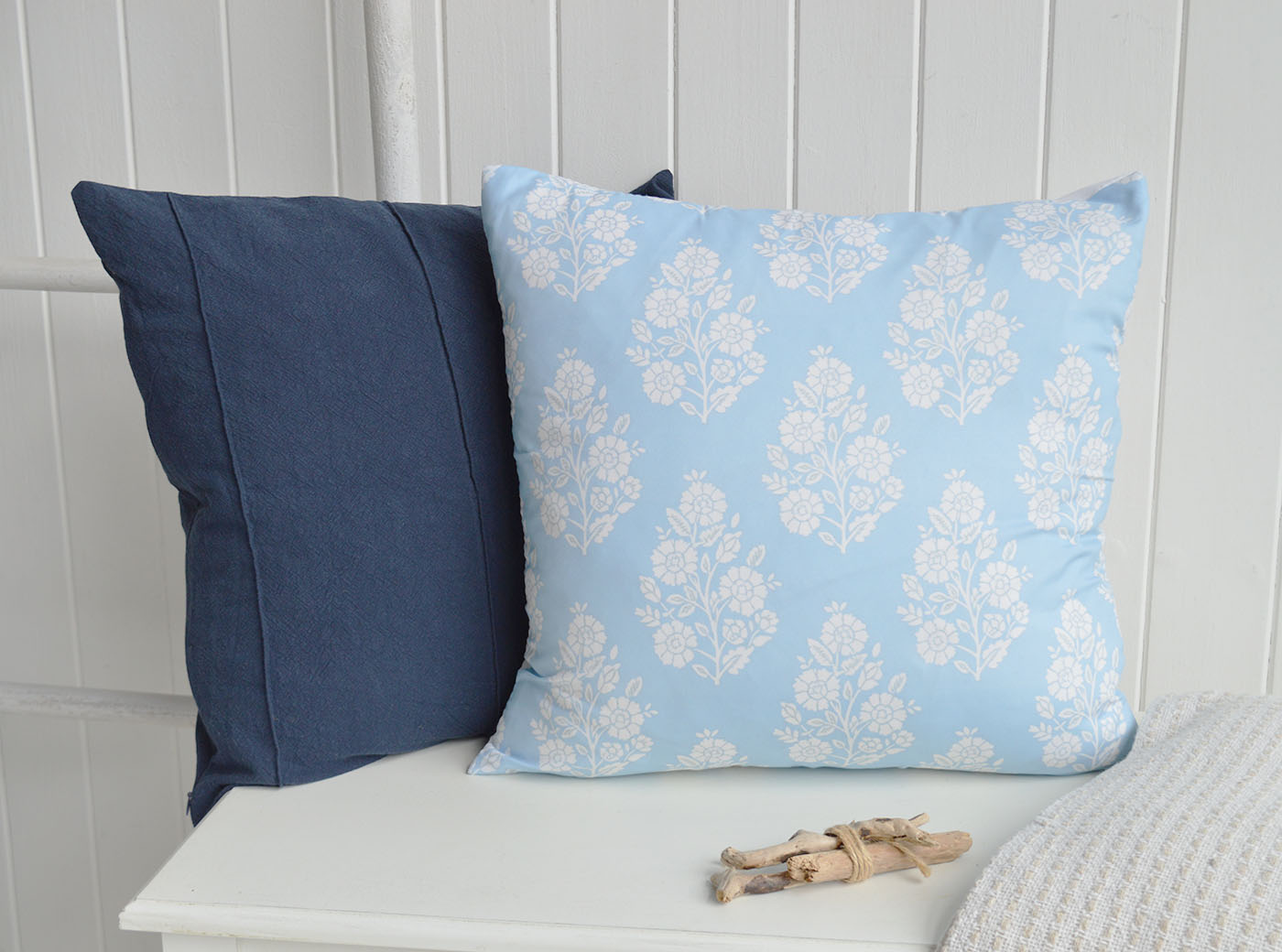 The soft blue floral print paired with deep navy creates a classic New England look with a calm coastal feel.