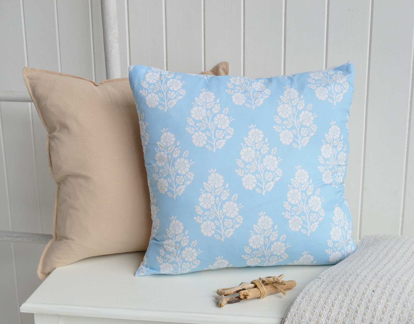 Soft powder blue and warm neutral tones create a calm and timeless look perfect for modern coastal and country interiors.