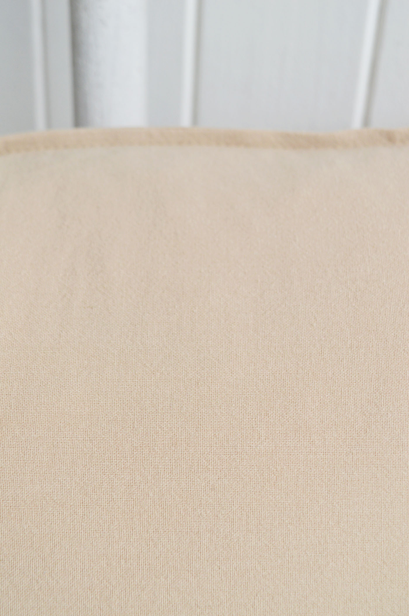 A beautifully soft neutral fabric with a timeless linen-look texture, perfect for layering into relaxed coastal interiors, Hamptons homes and elegant New England décor.