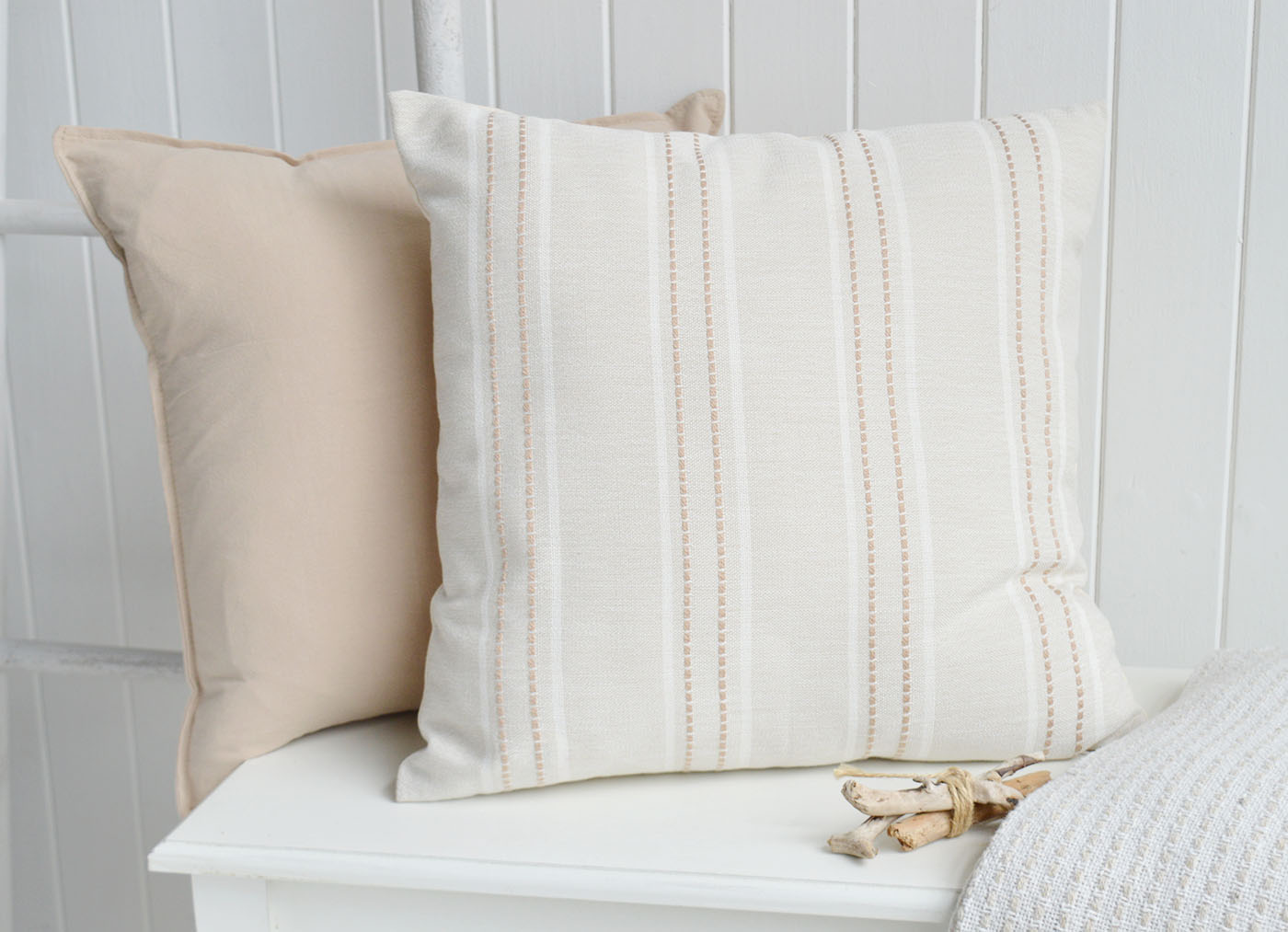 Soft woven stripes and warm neutral tones bring an effortless layered look to coastal interiors, New England homes and elegant modern country spaces.