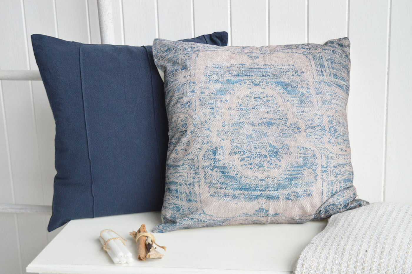     Create a calm and inviting New England interiors look with the Wainscott Cushion Cover, featuring a heritage-inspired blue print perfect for coastal furniture and neutral interiors.