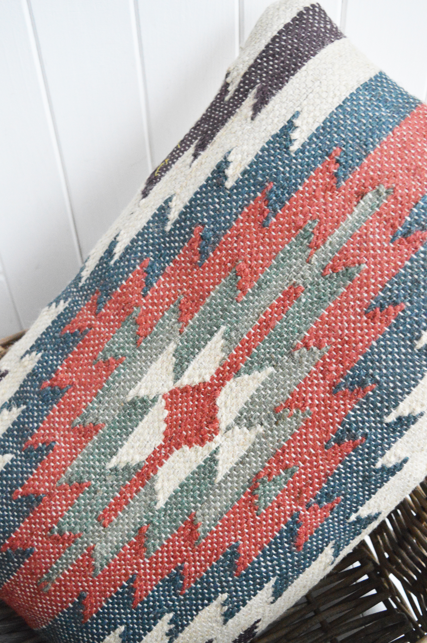 Layer the Redwood Ridge Cushion with soft linens and whites for a calm, balanced look.