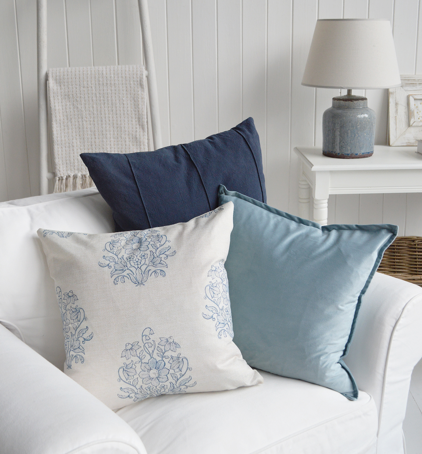 Add a relaxed beach house feel to sofas, armchairs and beds with this soft blue cushion cover.